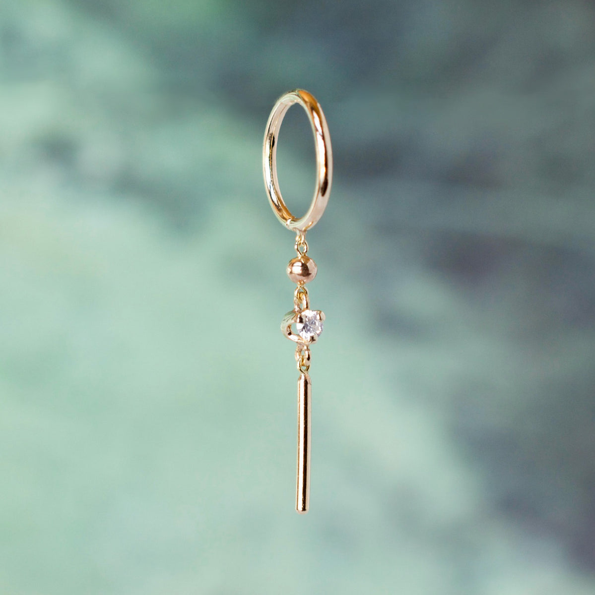 Diamond Huggie – Somatic Body Piercing